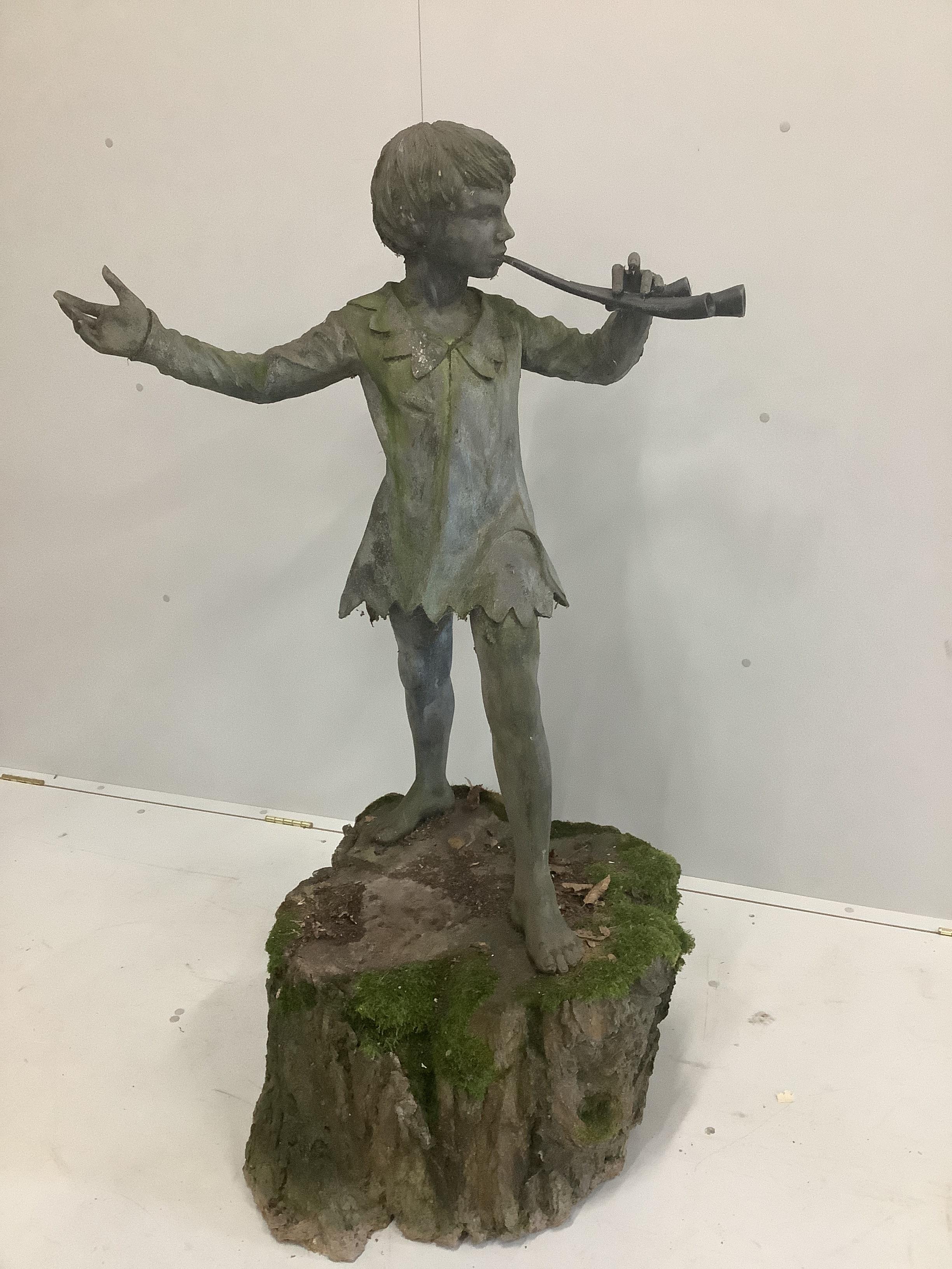 Everard Meynell (b.1950), simulated lead composition garden statue of Peter Pan, mounted on natural tree trunk plinth, height 100cm, height overall 135cm